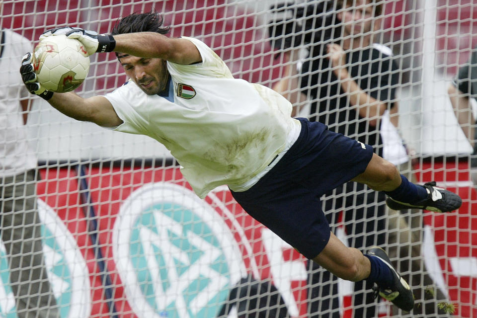 FILE - Gianluigi Buffon, goalkeeper of the Italian national soccer team, stretches for a ball during to the first training in Stuttgart, southern Germany, on Aug. 19, 2003. At age 45 and after a career that included a World Cup title with Italy, a long list of trophies with Juventus and many years when he was considered among the best goalkeepers in soccer, Gianluigi Buffon announced his retirement on Wednesday, Aug. 2, 2023. (AP Photo/Daniel Maurer)