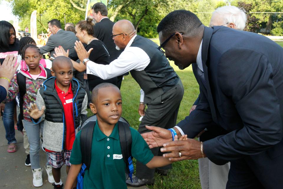 MPS Superintendent Keith Posley greets students on the first day of school on Tuesday, Sept. 4, 2018 at Maple Tree Elementary School at 6644 N 107th St, Milwaukee.