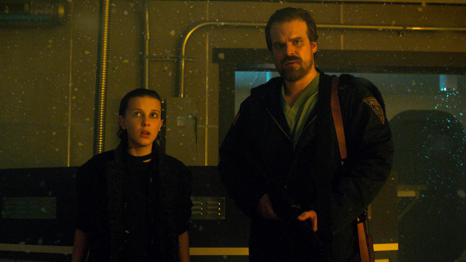 Millie Bobby Brown and David Harbour in the second season of <i>Stranger Things</i> (Netflix)