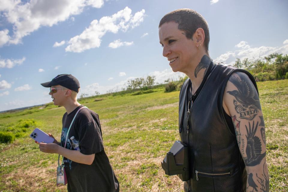 Singer/Songwriter Laura Jane Grace (right) looks out at alligators at La Chua Trail in Gainesville, Fla., on April 13, 2023.