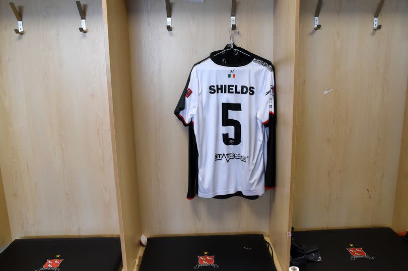 Photo showing an old Chris Shields Dundalk jersey