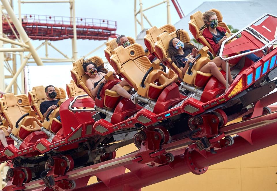 Guests at Universal Orlando’s theme parks must wear masks while aboard roller coasters such as Hollywood Rip Ride Rockit.