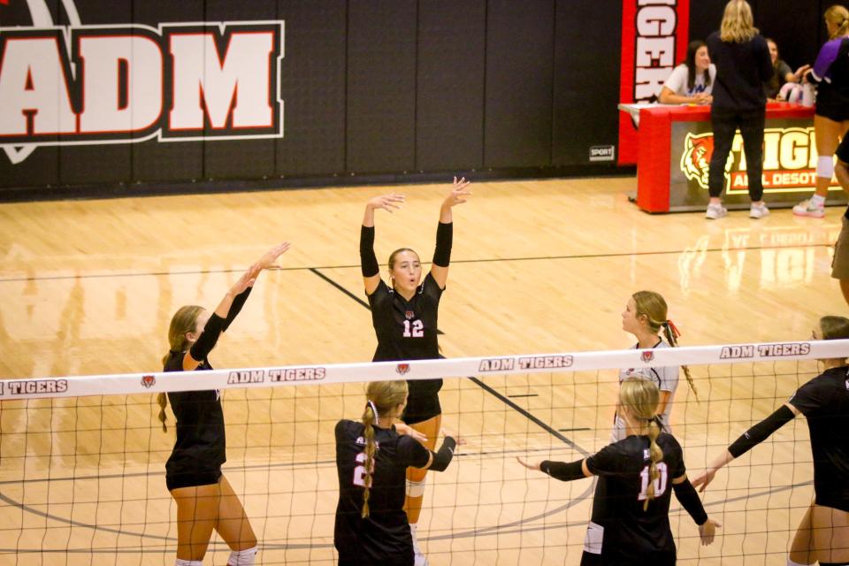 ADM players celebrate a point during a home invitational on Thursday, Aug. 31, 2023.