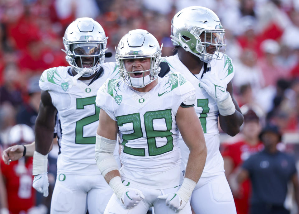 Oregon linebacker Bryce Boettcher (28) celebrates a sack against Texas Tech during the first half of an NCAA college football game, Saturday, Sept. 9, 2023, in Lubbock, Texas. (AP Photo/Chase Seabolt)