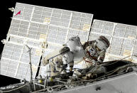 FILE - In this June 2, 2021 file image taken from Roscosmos video, Russian cosmonauts Oleg Novitsky, right, and Pyotr Dubrov, members of the crew to the International Space Station (ISS), perform their first spacewalk to replace old batteries outside the International Space Station. Russia's space chief said Tuesday, July 26, 2022, that they will opt out of the International Space Station after 2024 and focus on building its own orbiting outpost. (Roscosmos via AP, File)