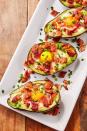 <p><a href="https://www.delish.com/cooking/recipe-ideas/g2894/things-to-do-with-avocado/" rel="nofollow noopener" target="_blank" data-ylk="slk:Avocado;elm:context_link;itc:0;sec:content-canvas" class="link ">Avocado</a>'s creamy texture pairs perfectly with a just set <a href="https://www.delish.com/cooking/g1920/egg-dinners/" rel="nofollow noopener" target="_blank" data-ylk="slk:egg;elm:context_link;itc:0;sec:content-canvas" class="link ">egg</a> and crispy <a href="https://www.delish.com/cooking/recipe-ideas/g2020/top-bacon-recipes/" rel="nofollow noopener" target="_blank" data-ylk="slk:bacon;elm:context_link;itc:0;sec:content-canvas" class="link ">bacon</a>. It's the perfect power breakfast move or healthy snack that will keep you moving this Easter.<br><br>Get the <strong><a href="https://www.delish.com/cooking/recipe-ideas/recipes/a45382/avocado-egg-boats-recipe/" rel="nofollow noopener" target="_blank" data-ylk="slk:Baked Avocado Boats recipe;elm:context_link;itc:0;sec:content-canvas" class="link ">Baked Avocado Boats recipe</a></strong>.</p>