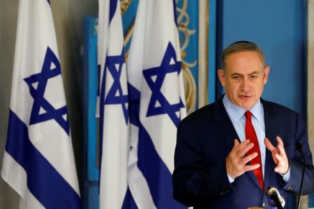 FILE PHOTO: Israeli Prime Minister Benjamin Netanyahu speaks during an event marking International Holocaust Remembrance Day, marked on January 27, at the Yad Vashem synagogue in Jerusalem January 26, 2017. REUTERS/Amir Cohen/File Photo