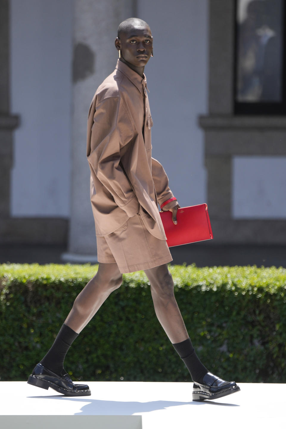 A model wears a creation as part of the Valentino men's Spring Summer 2024 collection presented in Milan, Italy, Friday, June 16, 2023. (AP Photo/Luca Bruno)