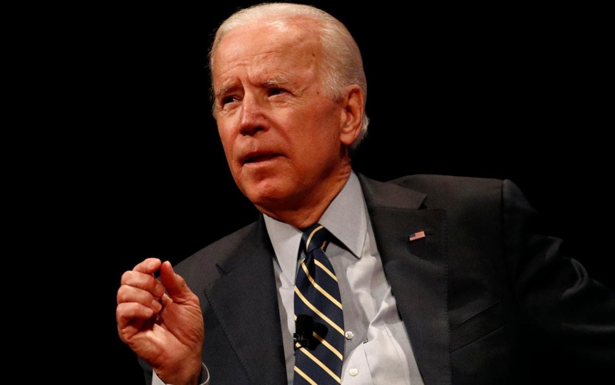 Joe Biden, the former US vice-president, said he would 'beat the hell out of' president Donald Trump if they were in high school - AP