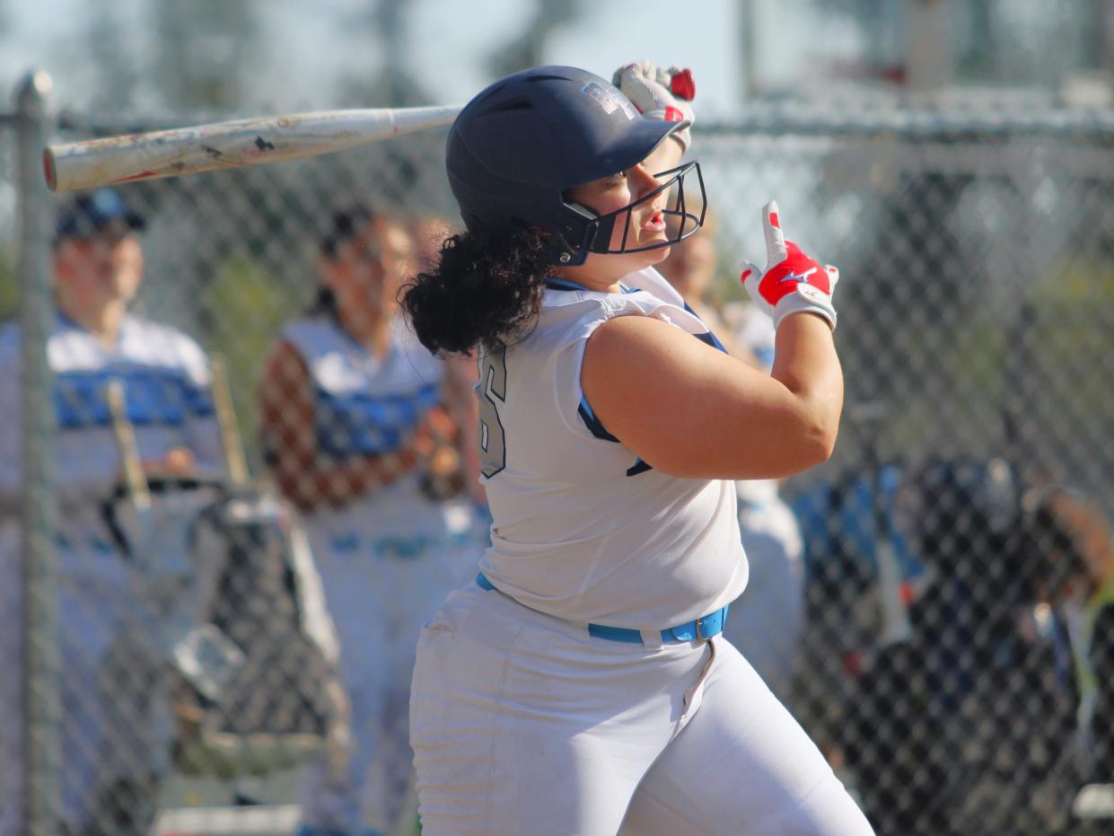 Bristol-Plymouth's Izzy Torres hits an RBI single during a Mayflower Athletic Conference game against Diman.