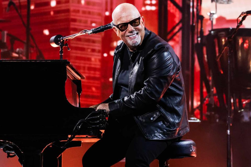 <p>John Shearer/Getty</p> Billy Joel performs onstage during the 66th GRAMMY Awards in February 2024 in Los Angeles