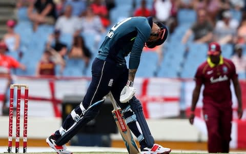 Alex Hales slumps after missing a delivery - Credit: AP