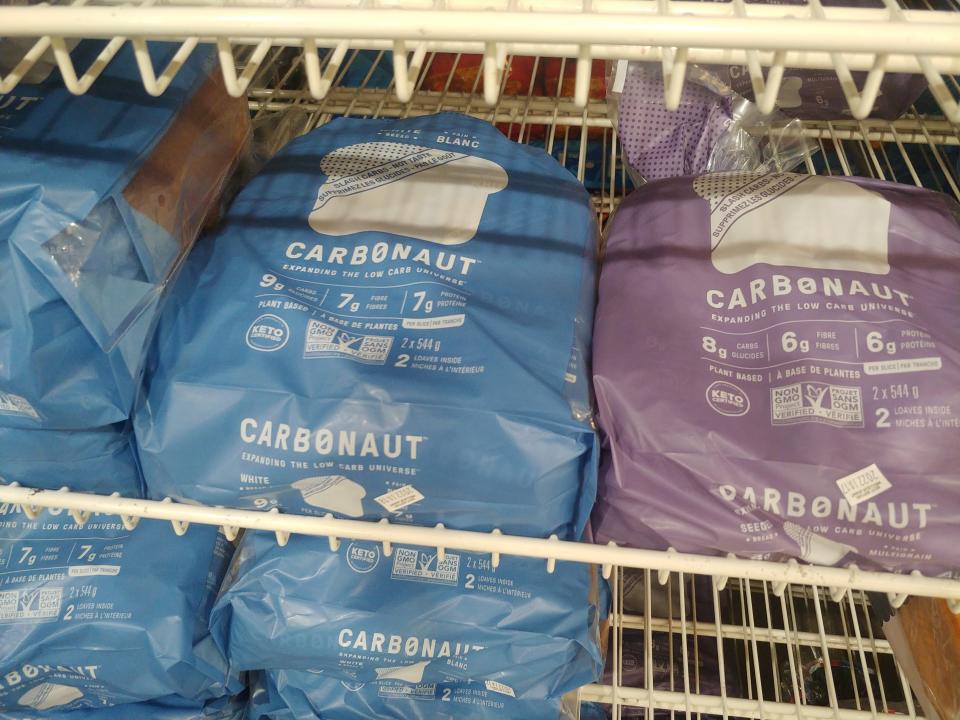 bags of carbonaut bread varieties on the shelves at costco