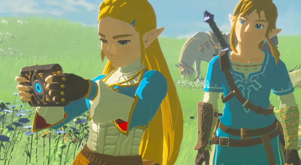 Zelda holding the Sheikah Slate with Link behind her in "The Legend of Zelda: Breath of the Wild"