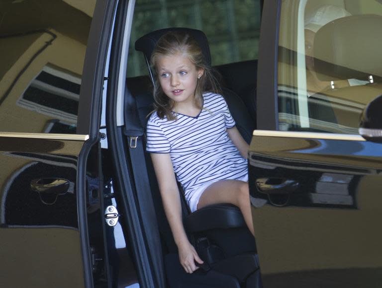 Princess Leonor, daughter of the Spanish Crown Prince, sits in a car in Palma de Mallorca on August 2, 2013