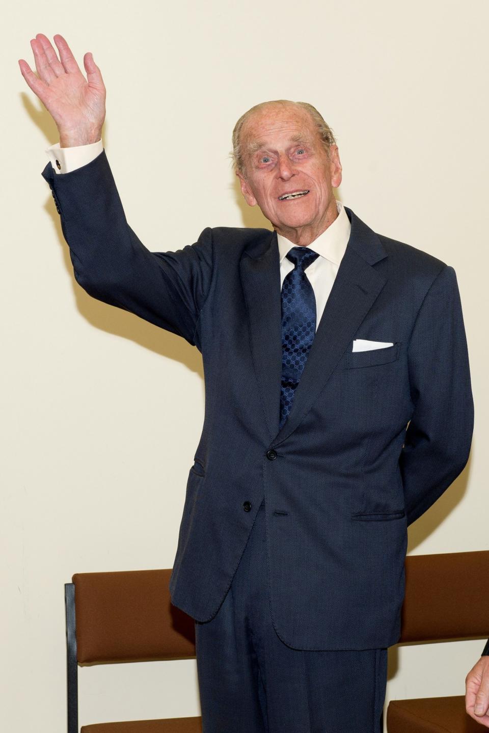 <p>The Duke of Edinburgh, waves during his official visit to the St Michael’s Care Complex in Aylsham, Norfolk, which provides care for the elderly. </p>