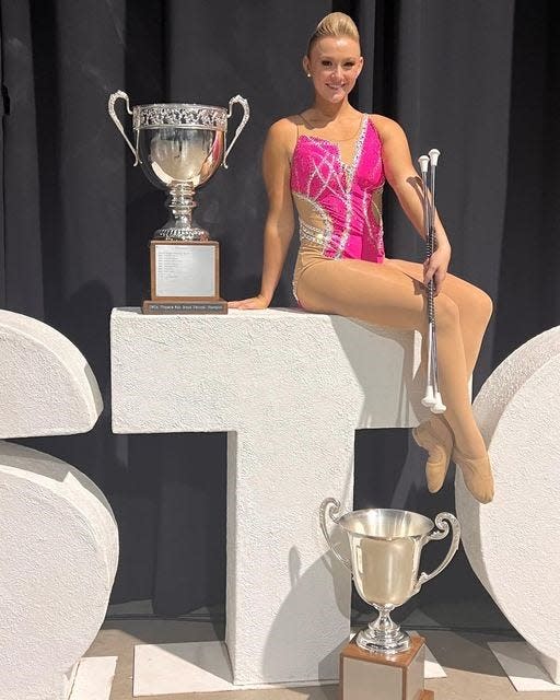 University of Tennessee student and band majorette Laney Puhalla is shown after winning the solo and two-baton competition at the U.S. national baton twirling championships this year.
2022