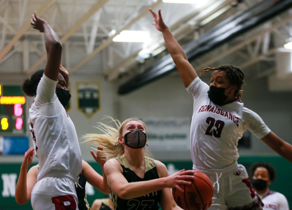 Macomb L'Anse Creuse's Olivia Chadwick attempts a layup against Detroit Renaissance in the first half of the Michigan high school girls basketball state quarterfinal game on Monday, April 5, 2021, in West Bloomfield.