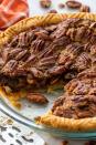 <p>Nothing screams Thanksgiving more than a classic pecan pie.</p><p>Get the recipe from <a href="https://www.delish.com/cooking/recipe-ideas/recipes/a55685/easy-pecan-pie-recipe/" rel="nofollow noopener" target="_blank" data-ylk="slk:Delish" class="link ">Delish</a>.</p>
