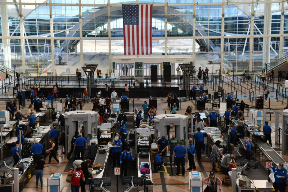 Photo of busy terminal at Denver International Airport.