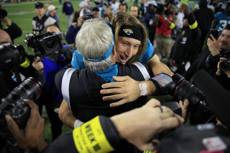 Jacksonville Jaguars quarterback Trevor Lawrence (16) hugs head coach Doug Pederson after the game of an NFL football regular season matchup AFC South division title game Saturday, Jan. 7, 2023 at TIAA Bank Field in Jacksonville. The Jacksonville Jaguars held off the Tennessee Titans 20-16. [Corey Perrine/Florida Times-Union]