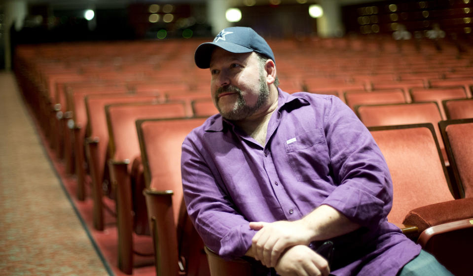 In this March 29, 2013 photo, composer Frank Wildhorn sits inside a theater in West Palm Beach, Fla. Wildhorn first found success as a pop and R&B songwriter, penning Whitney Houston's ballad "Where Do Broken Hearts Go.” He ruled Broadway in the late 1990s when he had three shows running simultaneously, a nearly four-year run for "Jekyll and Hyde," "The Scarlett Pimpernel" and "The Civil War," which all were nominated for Tony Awards. Now, Wildhorn's eighth Broadway show, a revamped revival of "Jekyll and Hyde," opens on April 18. (AP Photo/J Pat Carter)