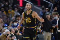 Golden State Warriors guard Stephen Curry (30) smiles after shooting a 3-point basket against the Portland Trail Blazers during the second half of an NBA basketball game in San Francisco, Friday, Nov. 26, 2021. (AP Photo/Jeff Chiu)