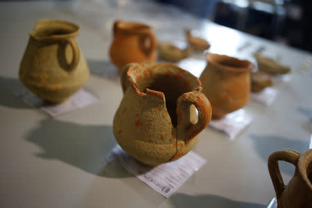 A view of findings from an ancient Roman cemetery with 2000-year-old skeletons and various artefacts, found below a restaurant in Lisbon, Portugal, January 24, 2019. REUTERS/Pedro Nunes