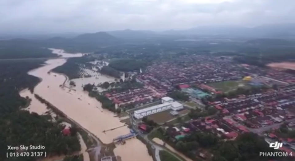 An aerial view shows the banks of a river overflowed after floodwater rose for more than 24 hours of incessant rain, in Kubang Semang, Bukit Mertajam, Penang