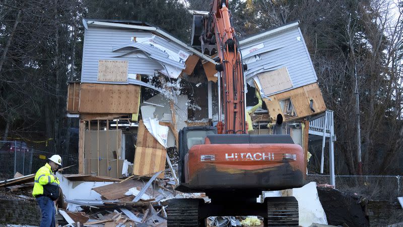 Heavy equipment is used to demolish the house where four University of Idaho students were killed in 2022 on Thursday, Dec. 28, 2023, in Moscow, Idaho. Students Ethan Chapin, Xana Kernodle, Madison Mogen and Kaylee Goncalves were fatally stabbed there in November 2022.
