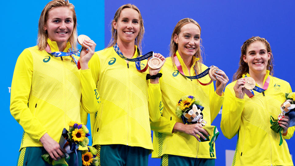 Ariarne Titmus, Emma McKeon, Maddy Wilson and Leah Neal, pictured here with their medals after the 4x200m freestyle relay at the Olympics. 