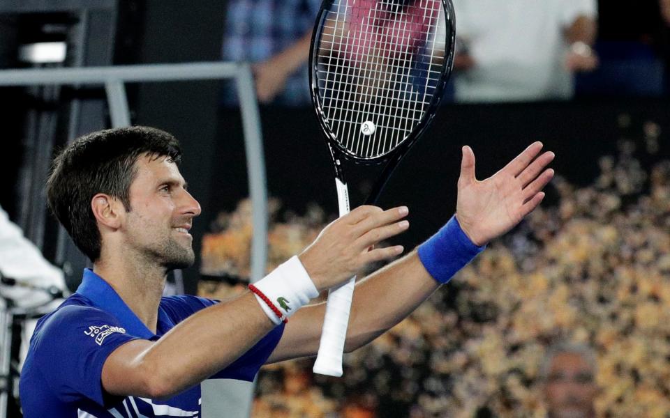 Novak Djokovic celebrates his second-round win over Jo-Wilfried Tsonga - AP