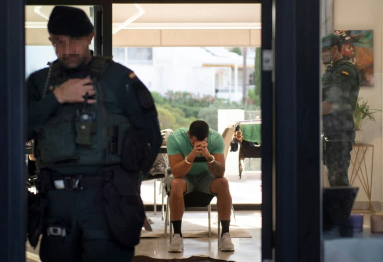 One of the suspects arrested by Spain's Guardia Civil in Mijas, near Malaga, on Wednesday (JORGE GUERRERO)