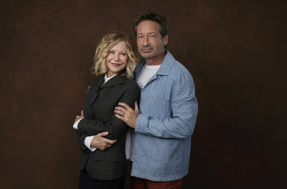 Actor-director Meg Ryan, left, poses with co-star David Duchovny at the Four Seasons Hotel in Los Angeles on Wednesday, Oct. 25, 2023, to promote their film "What Happens Later." (AP Photo/Chris Pizzello)