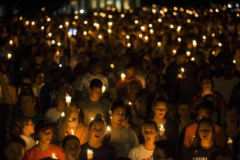 On Aug. 16, 2017, demonstrators with candles march along the path that white supremacists took days earlier&nbsp;with torches on the University of Virginia campus in Charlottesville.