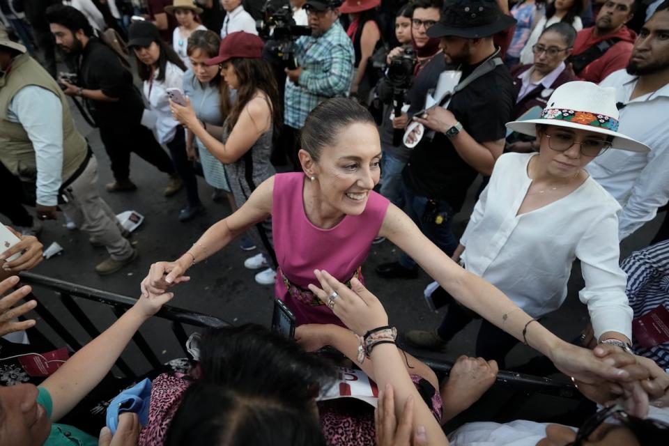 Mexico City Mayor Claudia Sheinbaum, right, greets supporters as she leaves a rally at the Revolution Monument in Mexico City on Thursday, June 15, 2023. Sheinbaum announced that she is resigning her post as Mexico City Mayor to enter the primary race for the country's 2024 presidential election.