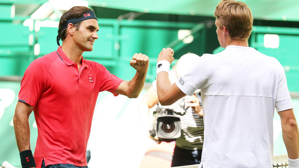 Roger Federer and Ilya Ivashka, pictured here after their match in Halle.