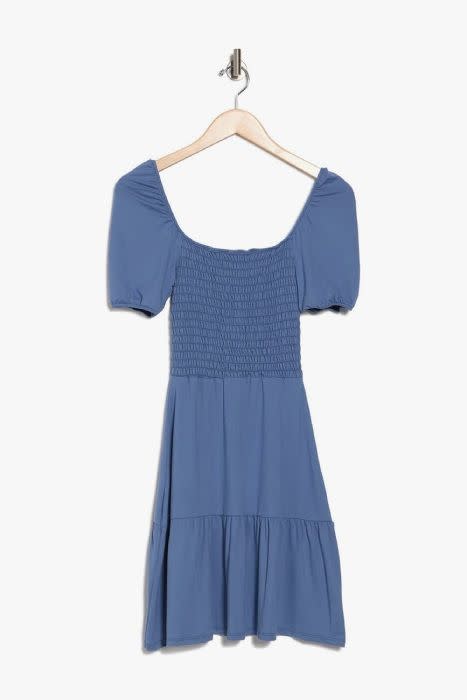 Her outfit has been identified as a £21 blue smocked dress from brand Velvet Torch. (Nordstrom)