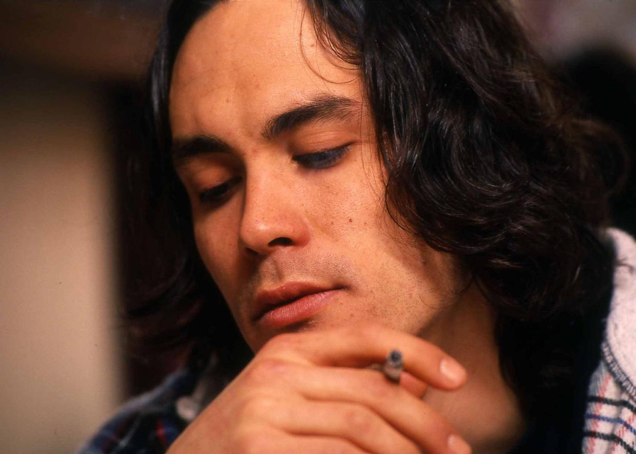 Actor Brandon Lee chain smokes cigarettes in his trailer during a late-night interview on March 23, 1993, the week before he died on the set of The Crow in Wilmington.