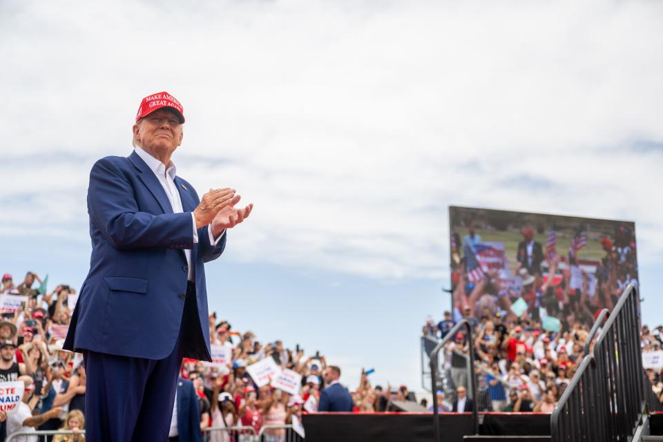 Republican presidential candidate, former U.S. President Donald Trump greets supporters upon arrival for his campaign rally at Sunset Park on June 09, 2024 in Las Vegas, Nevada.