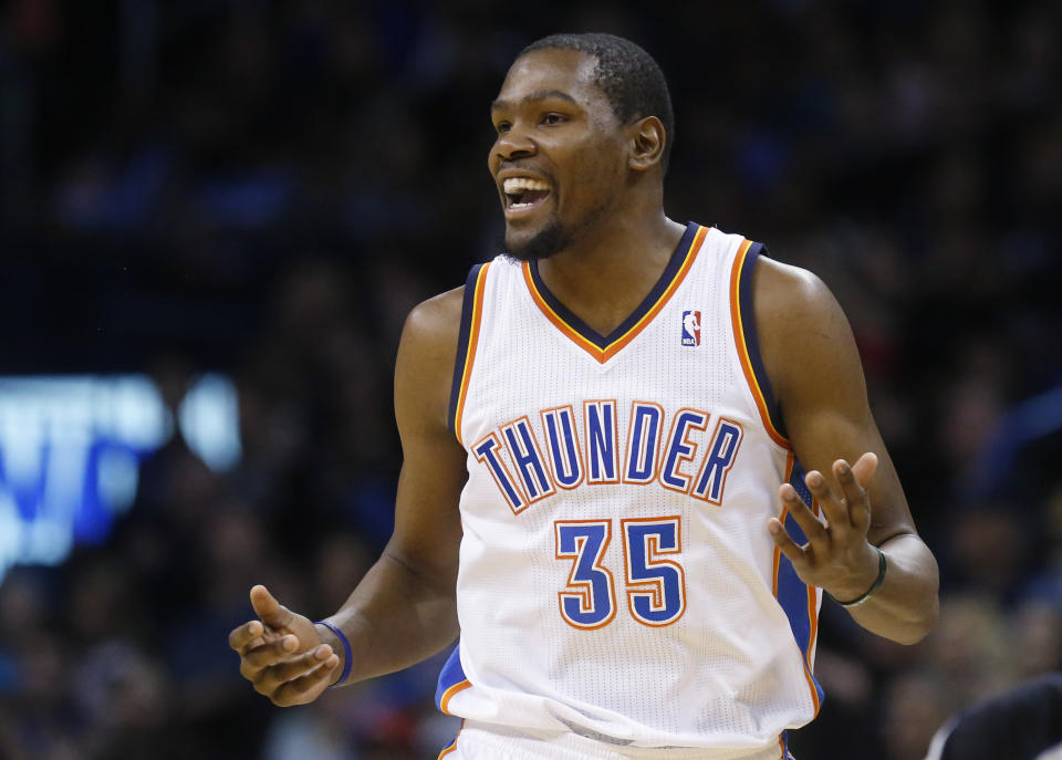 Oklahoma City Thunder forward Kevin Durant (35) smiles after hitting a basket in the second quarter of an NBA basketball game against the Portland Trail Blazers in Oklahoma City, Tuesday, Jan. 21, 2014. (AP Photo/Sue Ogrocki)