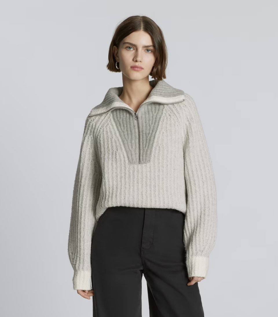 woman wearing black pants and grey The Luxe Teddy Oversized Half Zip Sweater (Photo via Everlane)