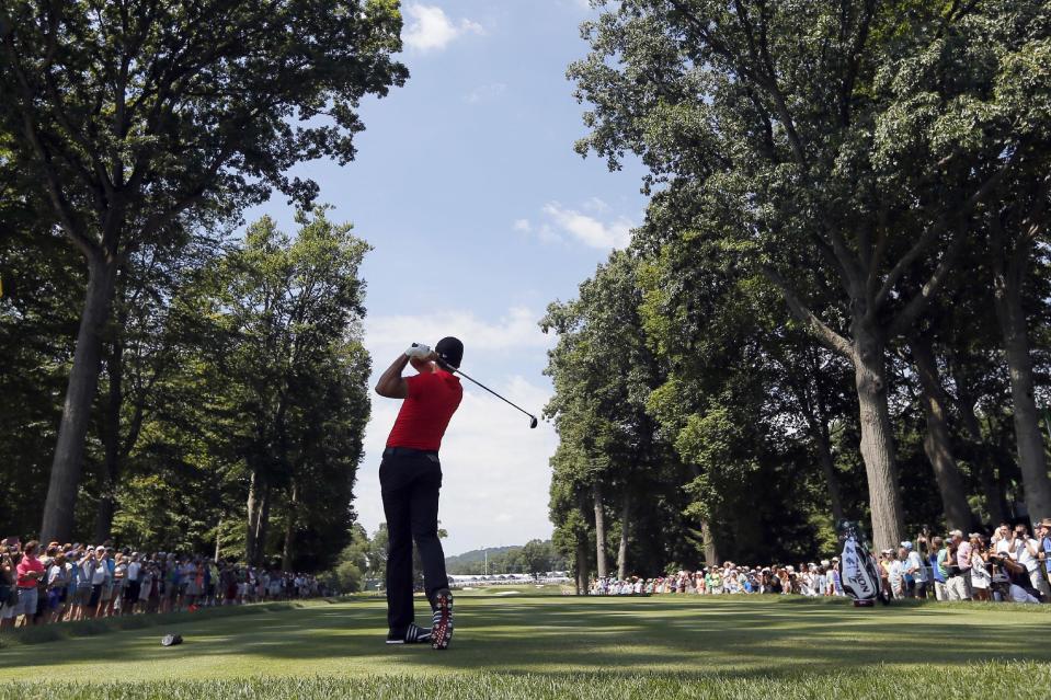 Jason Day watches his tee shot on the fifth hole during a practice round for the PGA Championship. (AP)