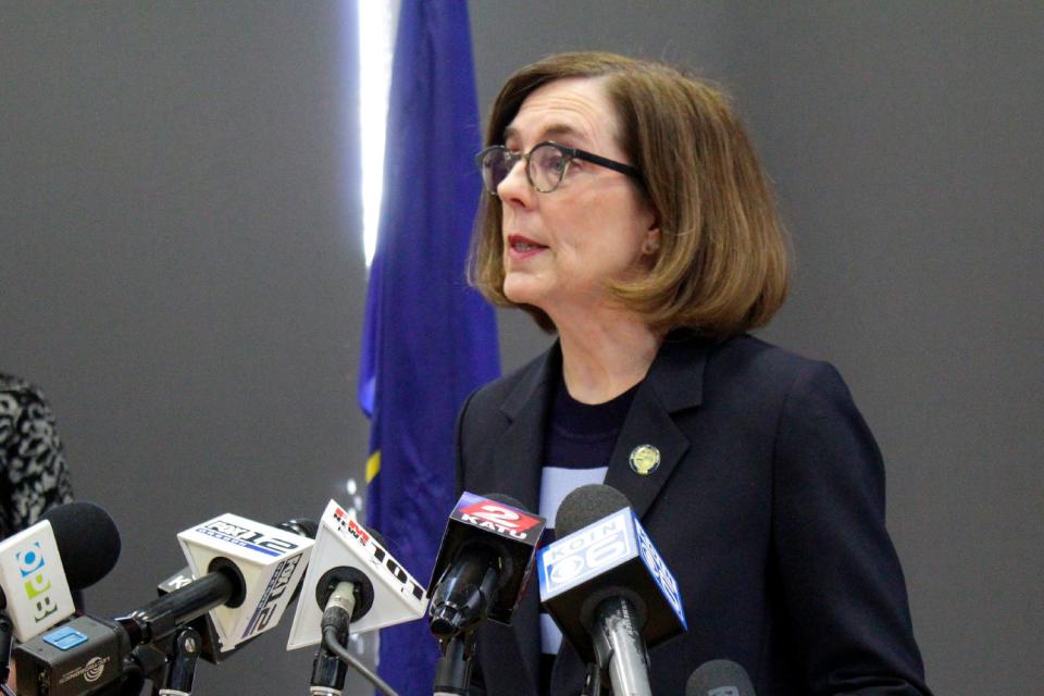 Oregon Gov. Kate Brown announced Thursday night she would pause reopening plans for at least one week after the number of daily new infections nearly doubled.  