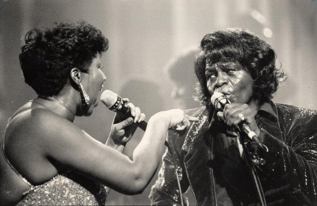 James Brown, right, performs with Aretha Franklin in Detroit, Mich., in January 1987. Brown was known as the Godfather of Soul, while Franklin was known as the Queen of Soul. (Richard Lee/Detroit Free Press/Tribune News Service via Getty Images)