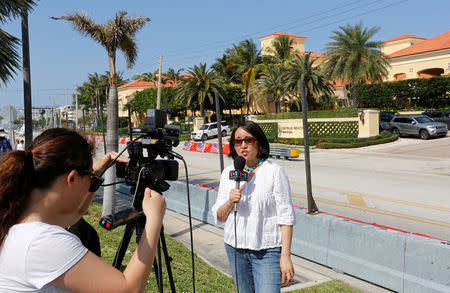 A Voice of America crew reports in front of the Eau Palm Beach Resort and Spa where President of China Xi Jinping will stay in Manalapan, Florida U.S., April 5, 2017. U.S. President Donald Trump will meet with Xi Jinping on April 6 and 7 at his nearby Mar-a-Lago estate. REUTERS/Joe Skipper