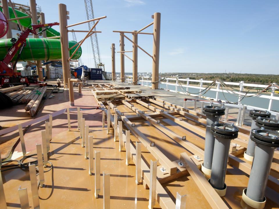 The Thrill Island neighborhood with water slides under scaffolding while it's being constructed on Royal Caribbean's Icon of the seas