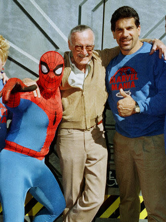 FILE PHOTO: Marvel Comic Books founder Stan Lee poses with one of his characters "Spider-Man" and actor Lou Ferrigno who portrayed "The Incredible Hulk" on television, during the grand opening of the Marvel Mania restaurant at Universal CityWalk in Los Angeles, California, U.S., February 18. REUTERS/Fred Prouser/File Photo