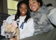 <p>In February, the couple debuted their dog, Lilo. Both humans look ecstatic; their French bulldog, not so much. (Photo: <a rel="nofollow noopener" href="https://www.instagram.com/p/BfEgfkwHyd4/?hl=en&taken-by=simonebiles" target="_blank" data-ylk="slk:Simone Biles via Instagram;elm:context_link;itc:0;sec:content-canvas" class="link ">Simone Biles via Instagram</a>) </p>