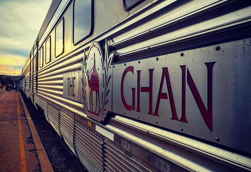 <p>The Aussie equivalent of the Orient Express, The Ghan train has been in operation since its inaugural trip way back in 1929 and today it’s one of Australia’s two most epic rail journeys. <br><br><br>The 2979-kilometre, 54-hour journey heads straight up the Red Centre from Adelaide to Darwin (and vice versa). It takes three days and two nights north-bound (four days and three nights south-bound) but many guests join in Alice Springs to make the overnight journey to Darwin. Aside from the stunning scenery, Platinum or Gold Service guests travel in style with all-inclusive meals and drinks in the classically styled Queen Adelaide Restaurant carriage. The journey attracts both local and international tourists, so you’ll be sharing your dining table with a mixture of characters - many of whom wouldn’t be out of place in an Agatha Christie novel.</p>